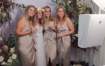 creative booth bridal party in booth